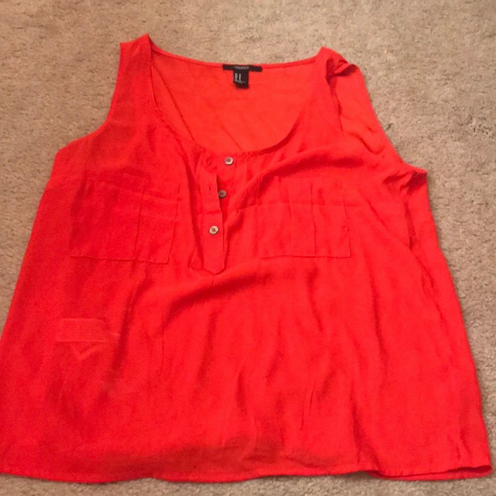 Red sleeveless shirt